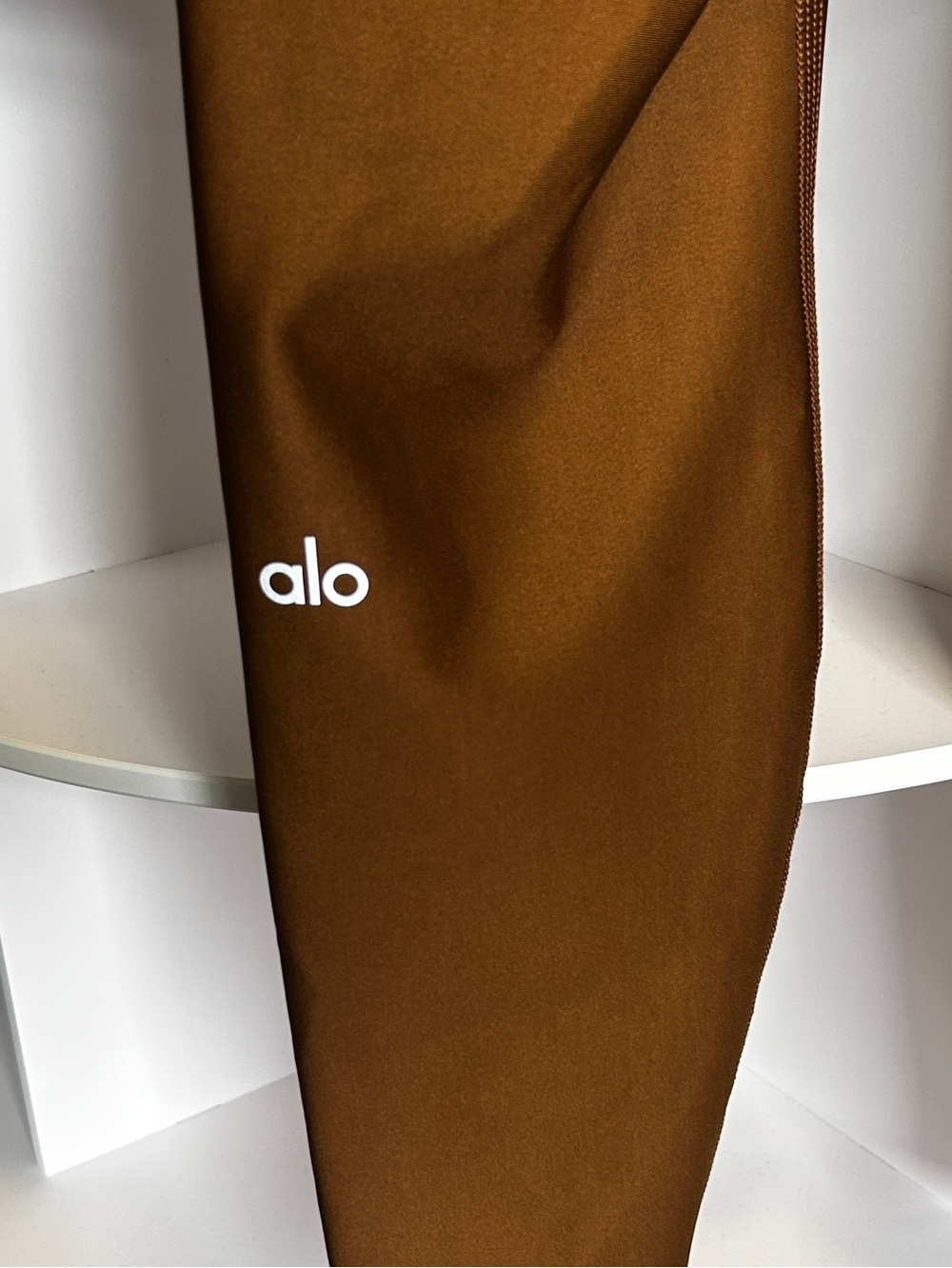 Alo Airlift Leggings in a Copper brown color - Picture 6 of 7